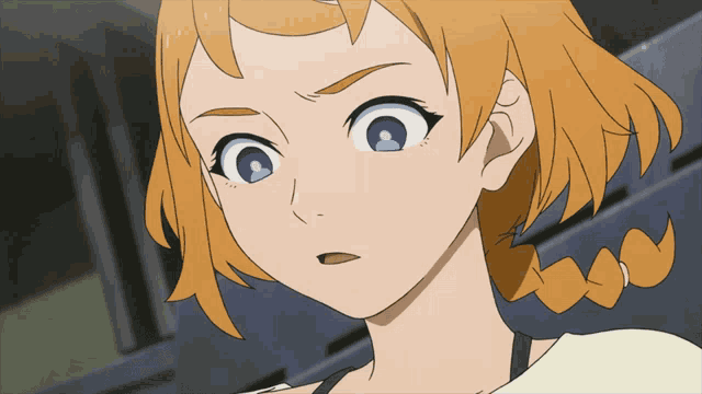 a close up of a girl 's face with braids and blue eyes