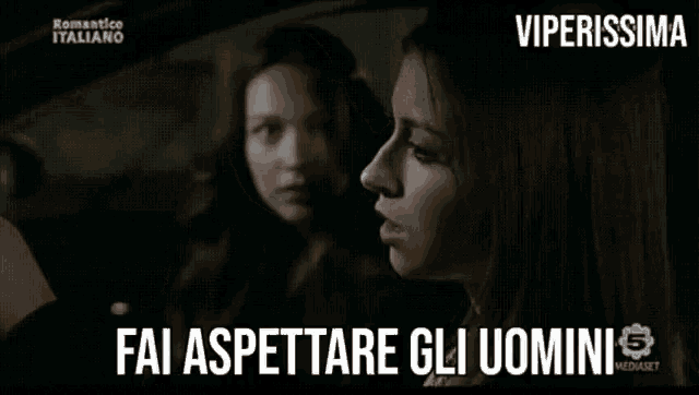 two women sitting in a car with the words fai aspettare gli uomini