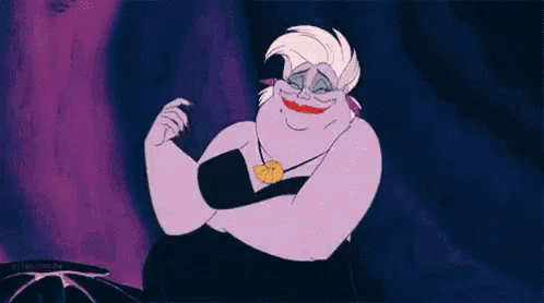 ursula from the little mermaid is smiling with her arms crossed and a necklace on her neck .