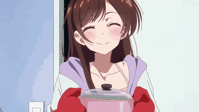 a girl is holding a pot with a lid on it