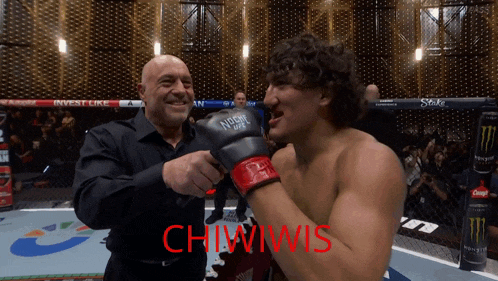 a man in a boxing ring with the word chiwiwis on the bottom right