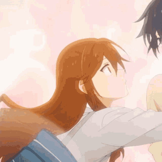 a couple of anime characters are hugging each other