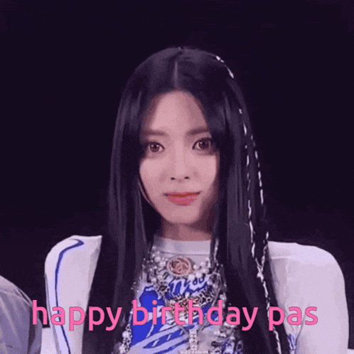 a woman with long black hair says happy birthday pas in pink letters