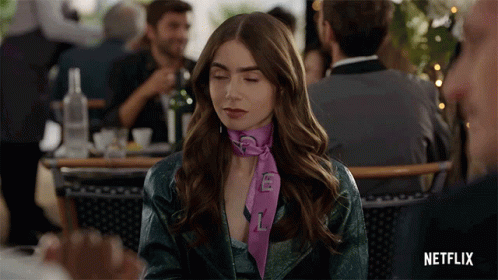 Shaking My Head Lily Collins GIF - Shaking My Head Lily Collins Emily Cooper GIFs