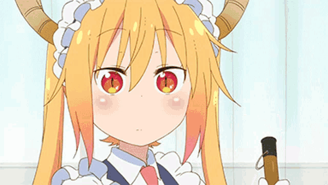 a girl with horns is standing next to a girl with glasses .