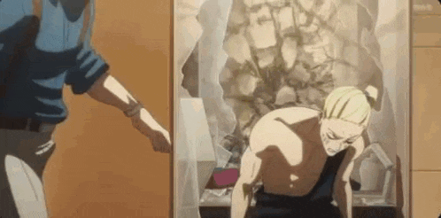 a man without a shirt is standing in front of a broken glass door .