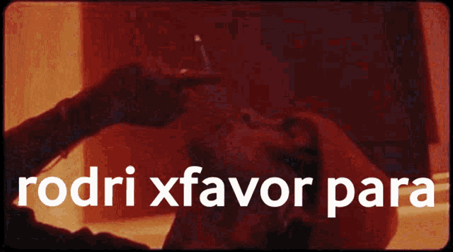 a person is smoking a cigarette with the words rodri xfavor para written on the bottom