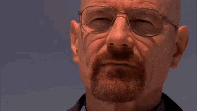 a man with glasses is saying you 're goddamn right