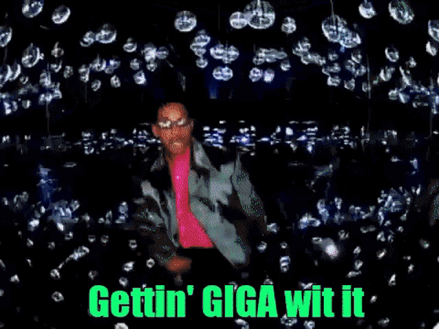 a man in a suit and pink shirt is surrounded by bubbles and says gettin ' giga wit it