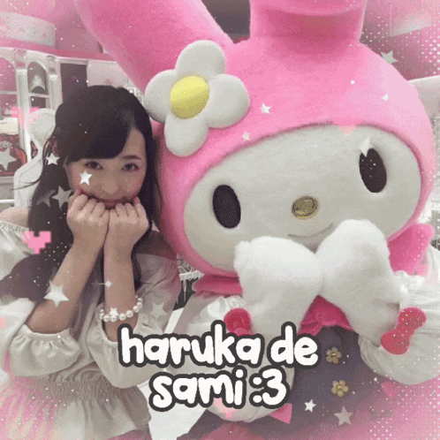 a girl is posing with a stuffed animal that says haruka de sami3