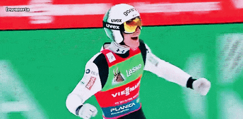 a skier wearing a helmet and goggles with lasko written on it