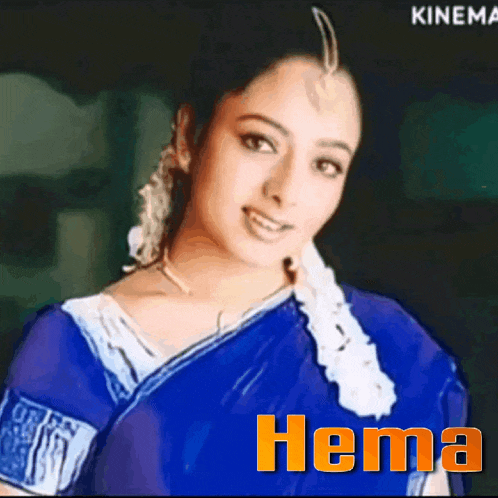 a woman wearing a blue saree with the word hema on the bottom