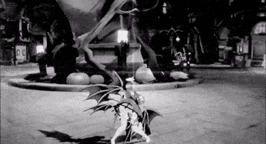 a black and white photo of a statue with the number 00 visible