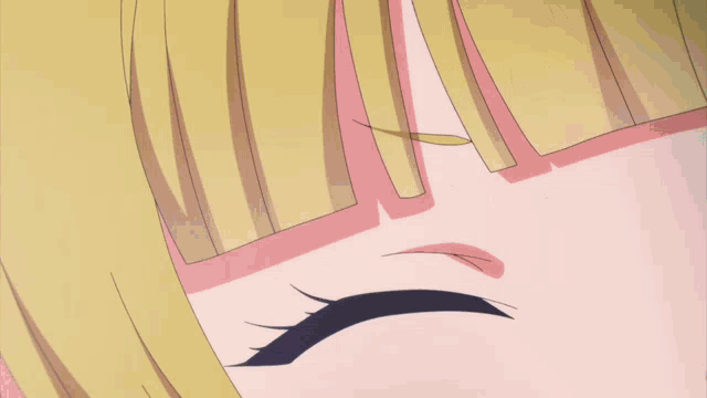 a close up of a girl 's eye with a tear running down her cheek