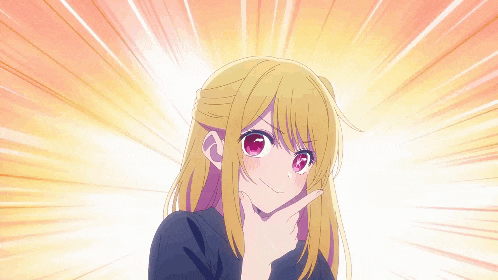 a girl with blonde hair is making a funny face