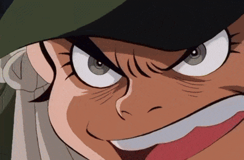 a close up of a cartoon character 's face with a green hat on