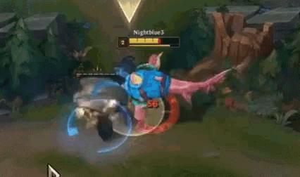 a league of legends game is being played on a computer and a person is being attacked by a monster .