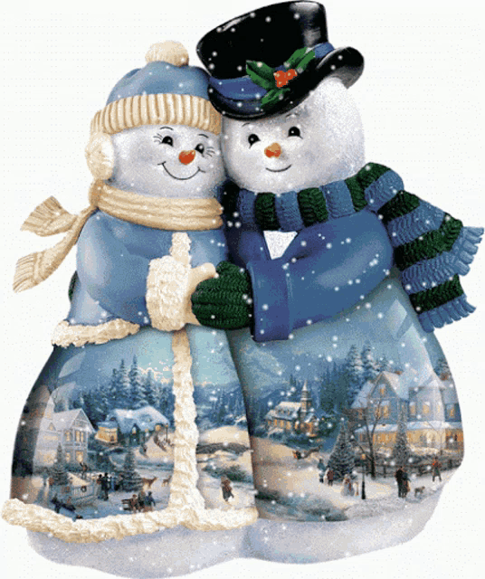 a couple of snowmen standing next to each other with a snowy scene in the background