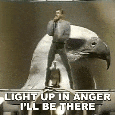 a man standing on top of an eagle with the words light up in anger i 'll be there written below him
