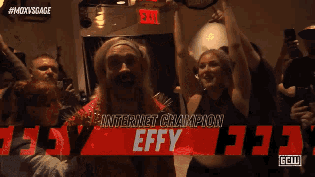 a group of people standing in front of a banner that says internet champion effy
