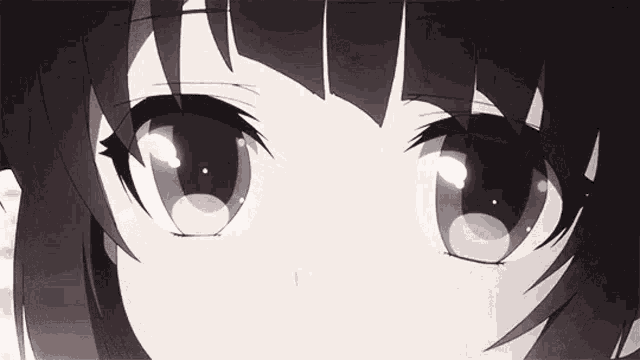 a close up of a girl 's eyes with a reflection of a person 's face .