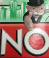 a monopoly game with a man in a top hat and a mustache pointing at the word no .