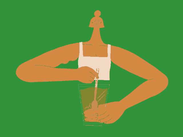 a woman is stirring a drink with a spoon in a glass