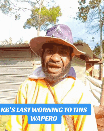 a man with a beard wearing a hat with the words kb 's last worning to this wapero on it