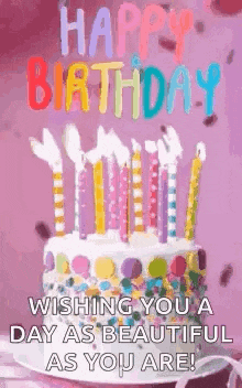 a happy birthday greeting card with a cake and candles on it .