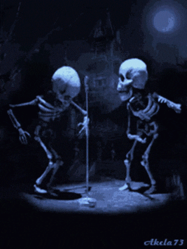 two skeletons are dancing in front of a microphone with the number 73 on the bottom