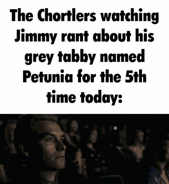 a man sitting in a theater watching a movie with the caption the shortlers watching jimmy