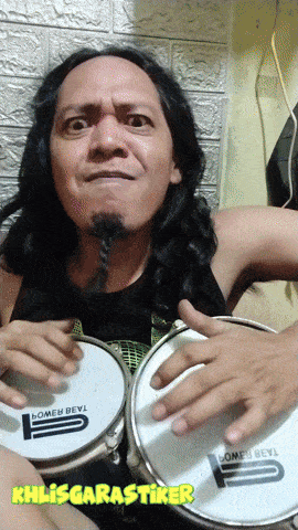 a man playing a pair of drums with khlsgarastiker written on the bottom