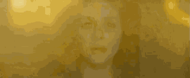 a silhouette of a woman standing in a dark room with a light behind her