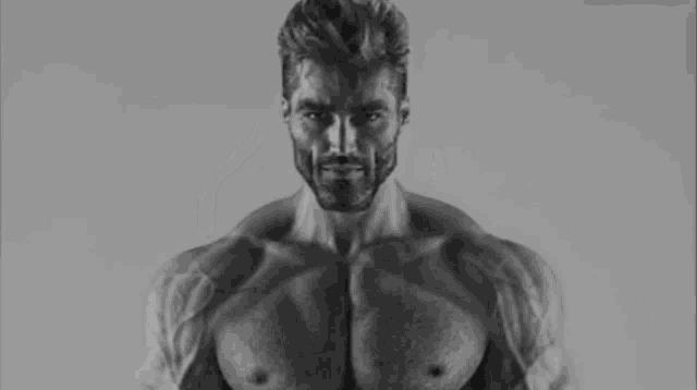 a black and white photo of a shirtless man with a beard and mustache .