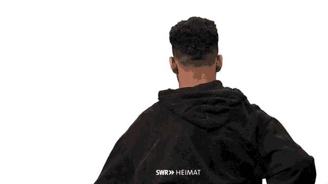 the back of a man wearing a black hoodie with swr written on it