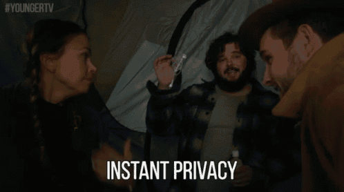 a group of people in a tent with instant privacy written on the screen