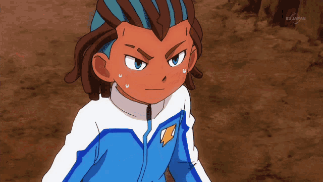 a boy in a blue and white jacket is on a tv show