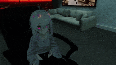 a girl with purple eyes is sitting in front of a couch in a dark room