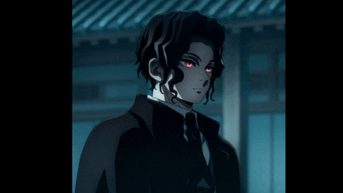 a man with red eyes is wearing a black suit