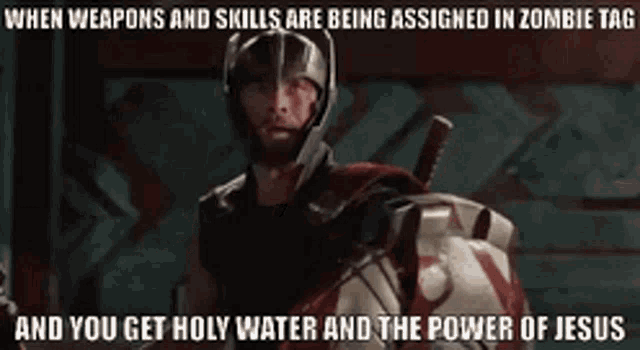 a man in a helmet with the words when weapons and skills are being assigned in zombie tag and you get holy water and