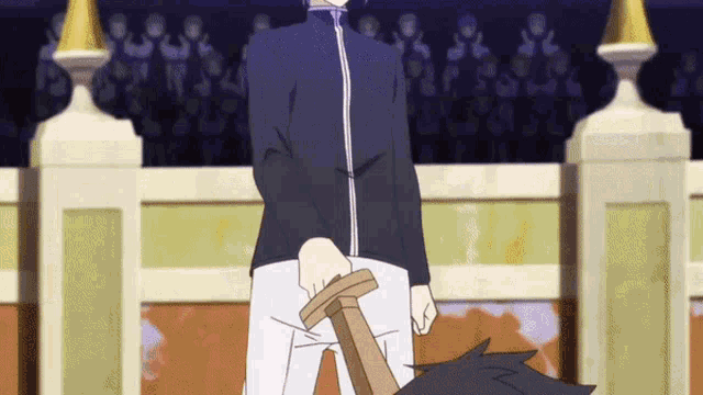 a man in a black jacket is holding a wooden sword .