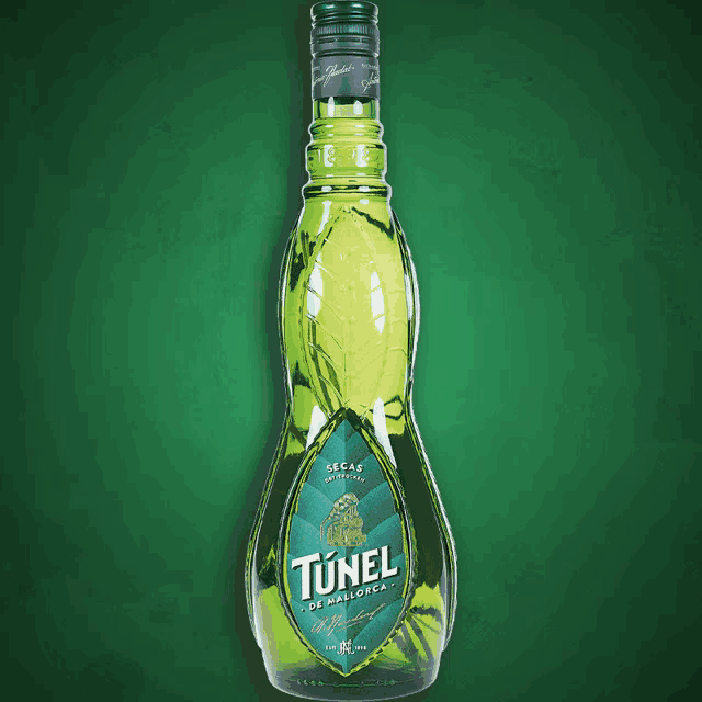 a green bottle of tunel de mallorca against a green background