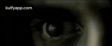 a close up of a person 's eye with the website kulfyapp.com written on the bottom .