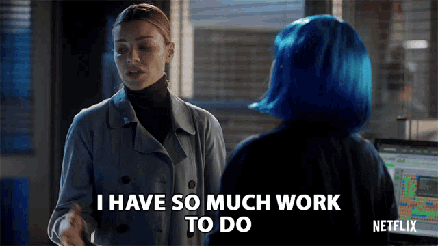 a woman with blue hair says i have so much work to do while talking to another woman