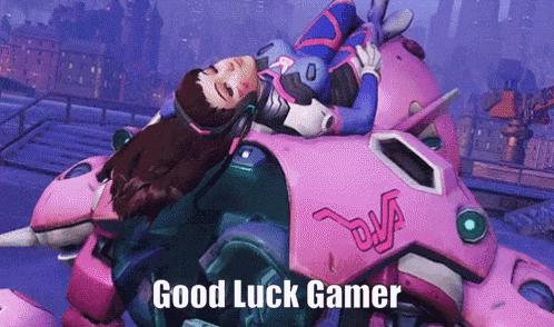 a woman is laying on top of a pink robot with the words good luck gamer written on the bottom