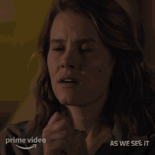 a close up of a woman 's face with the words as we see it below her