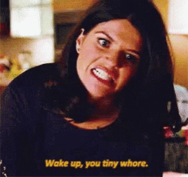 a woman says wake up you tiny whore in a kitchen