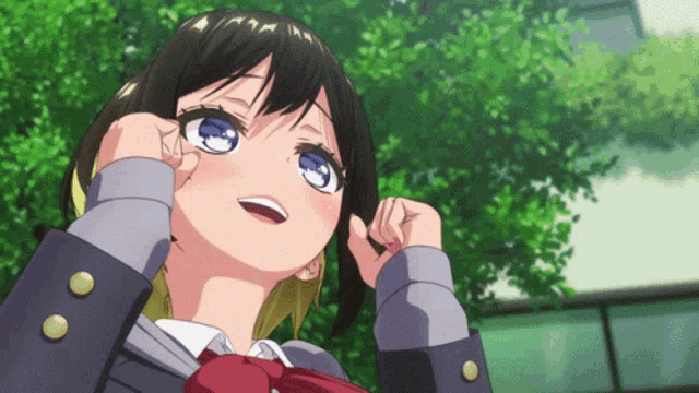 a close up of a girl with blue eyes looking up