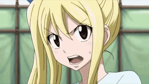 a close up of a blonde anime girl with her mouth open and a surprised look on her face .