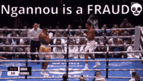 a boxing ring with the words ngamnou is a fraud
